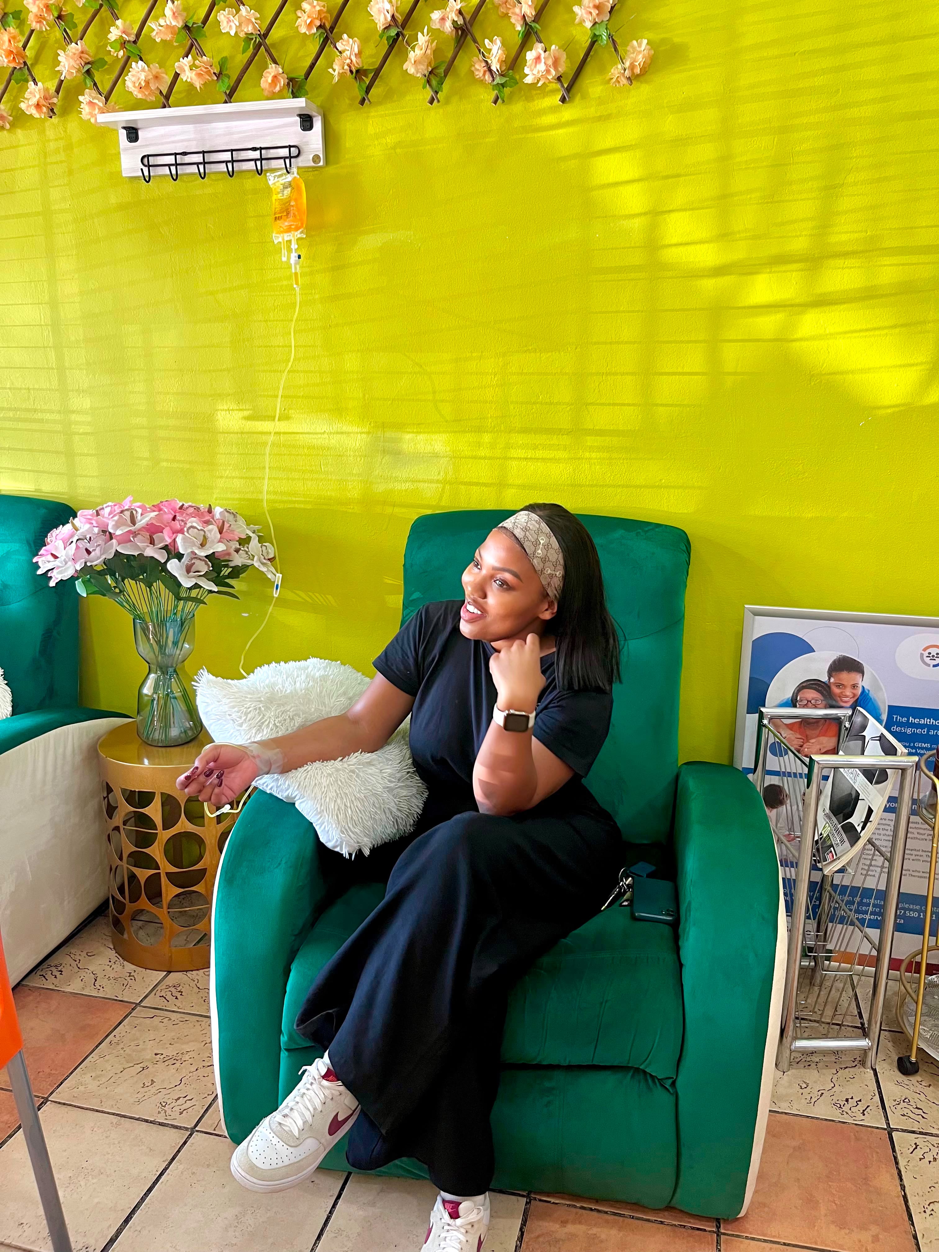A patient receiving an infusion in the lounge